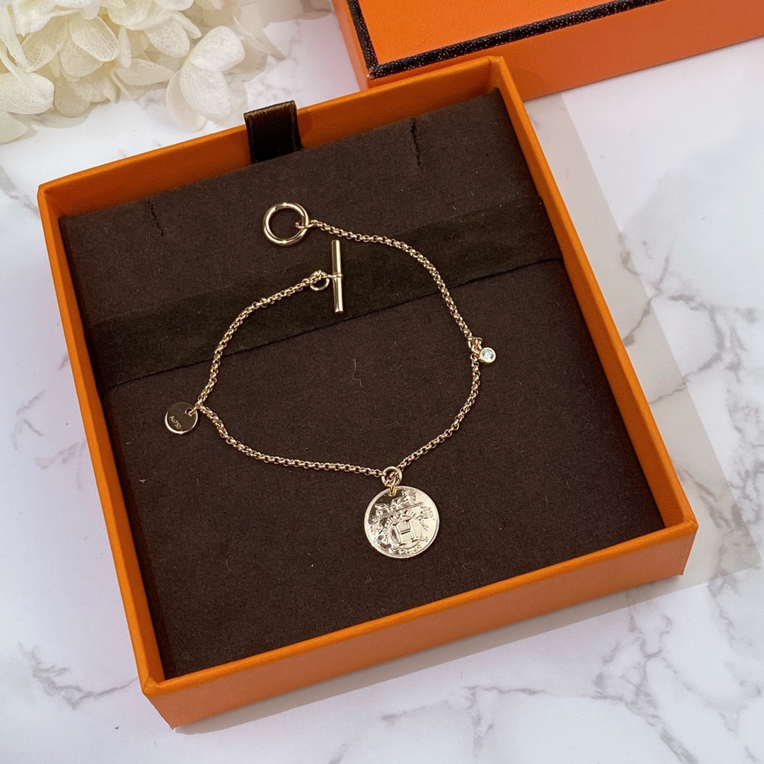 H**me5 coin bracelet