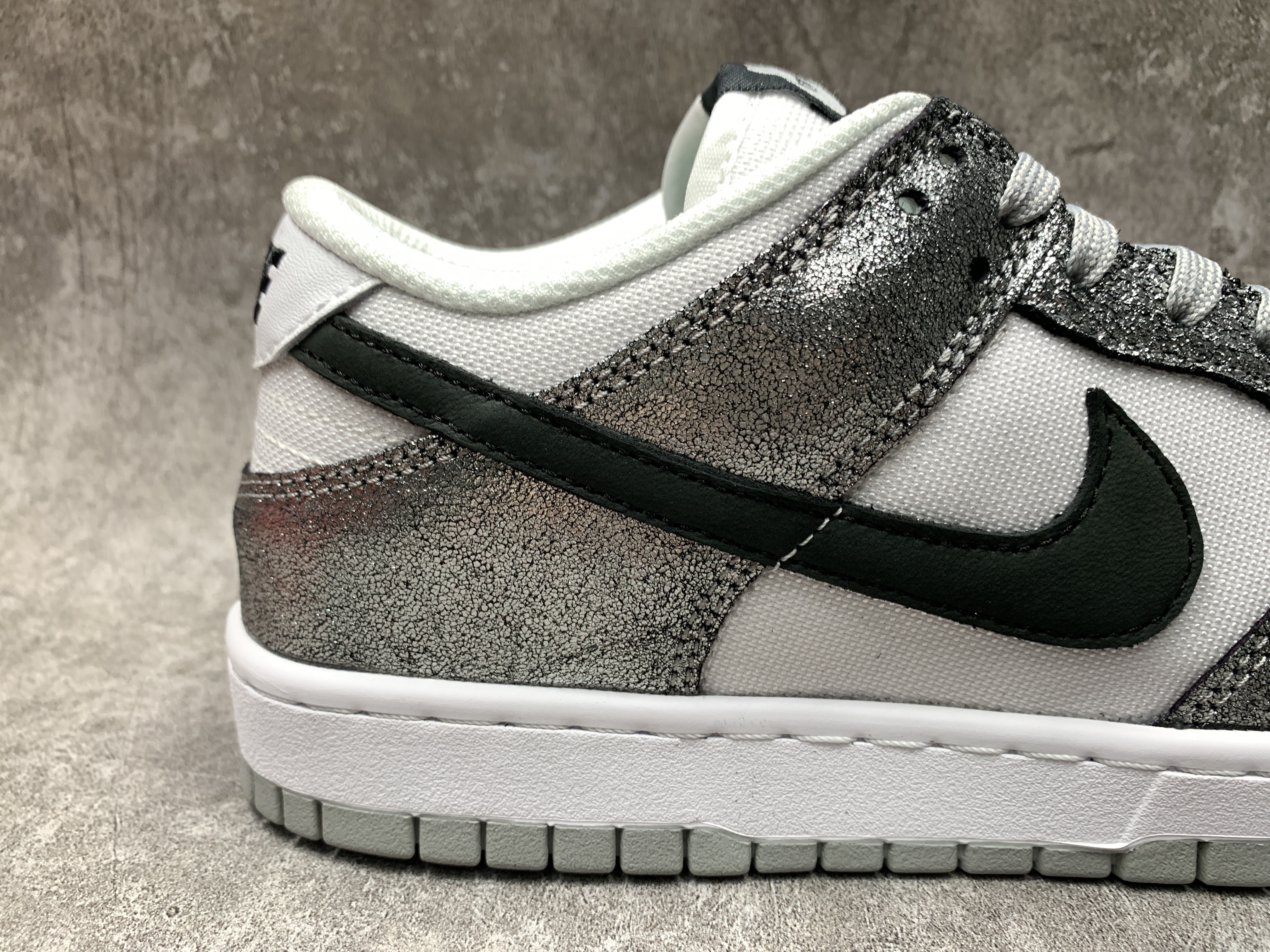 Nike Dunk Low Features Silver Cracked Leather