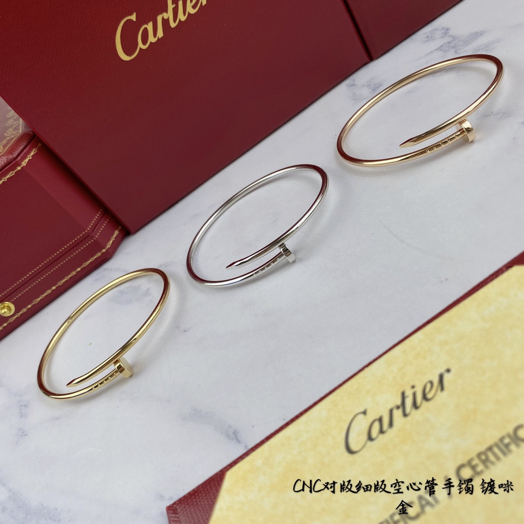 Ca*t*er thin hollow tube polished nail bracelet