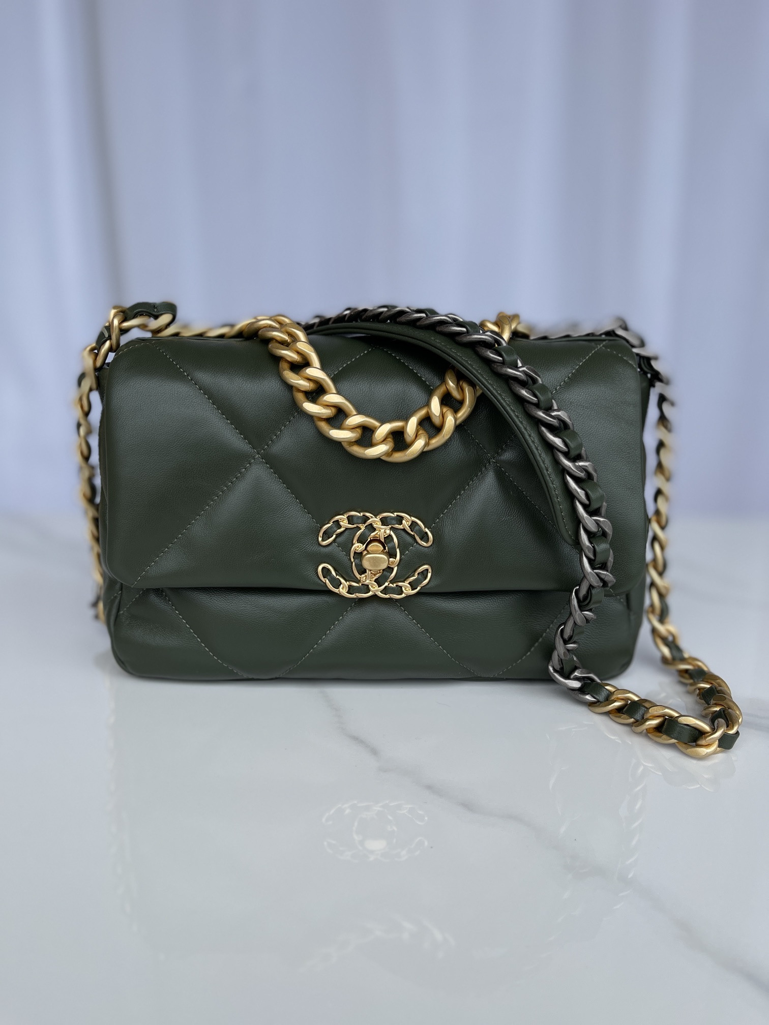 Ch*el 19 handbag shiny leather, gold-tone, silver-tone & ruthenium-finish metal dark green 6.2 × 10.1 × 3.5 in