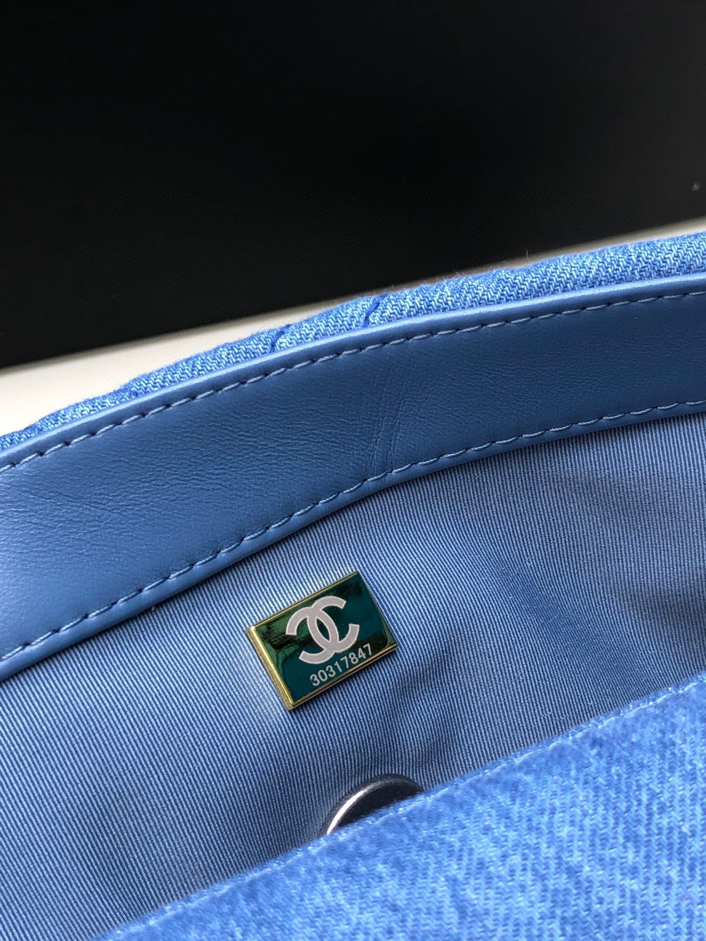 Ch*el 19 handbag, gold-tone, silver-tone & ruthenium-finish metal blue 6.2 × 10.1 × 3.5 in