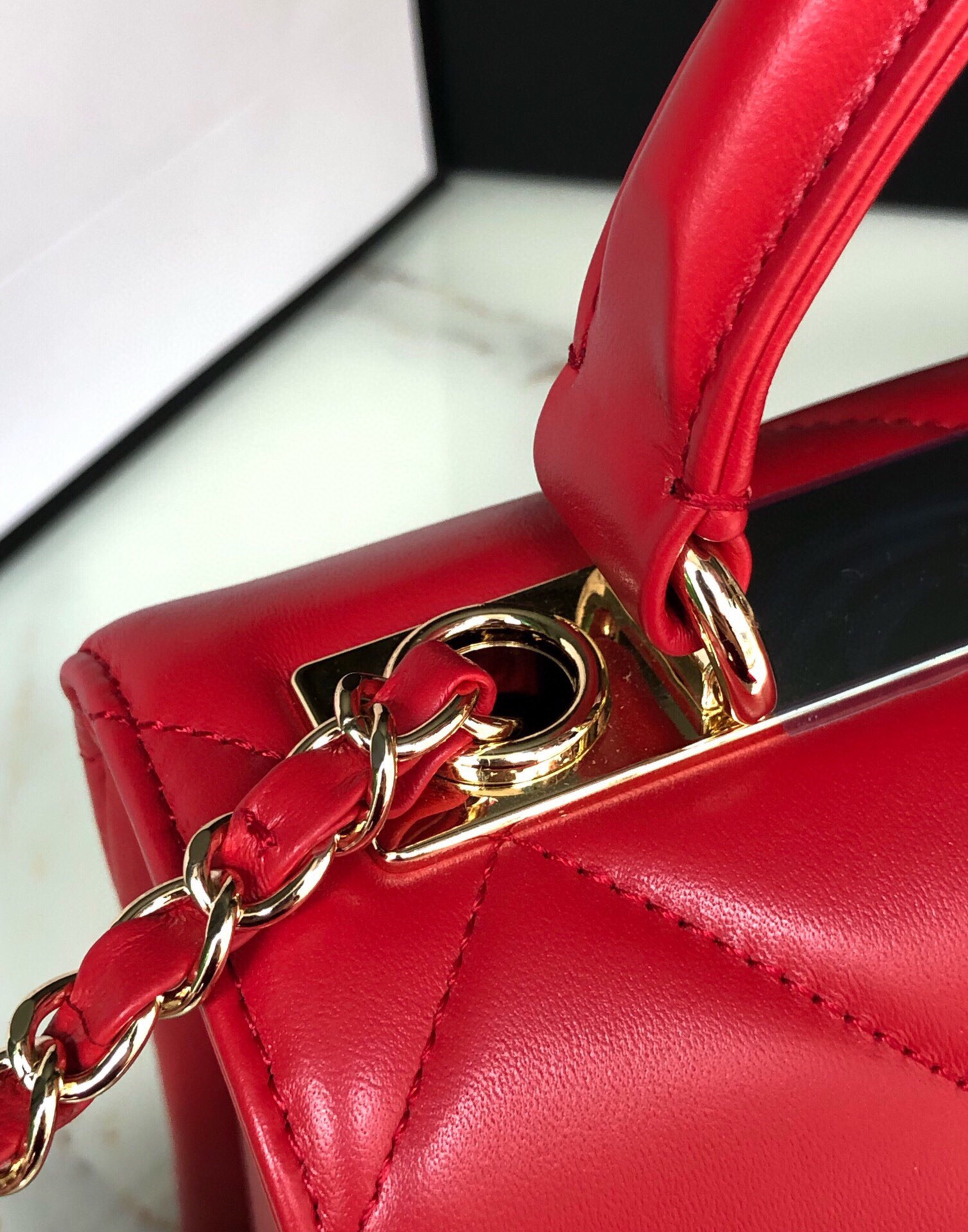 Ch*el flap bag with top handle 6.6 × 9.8 × 4.7 in