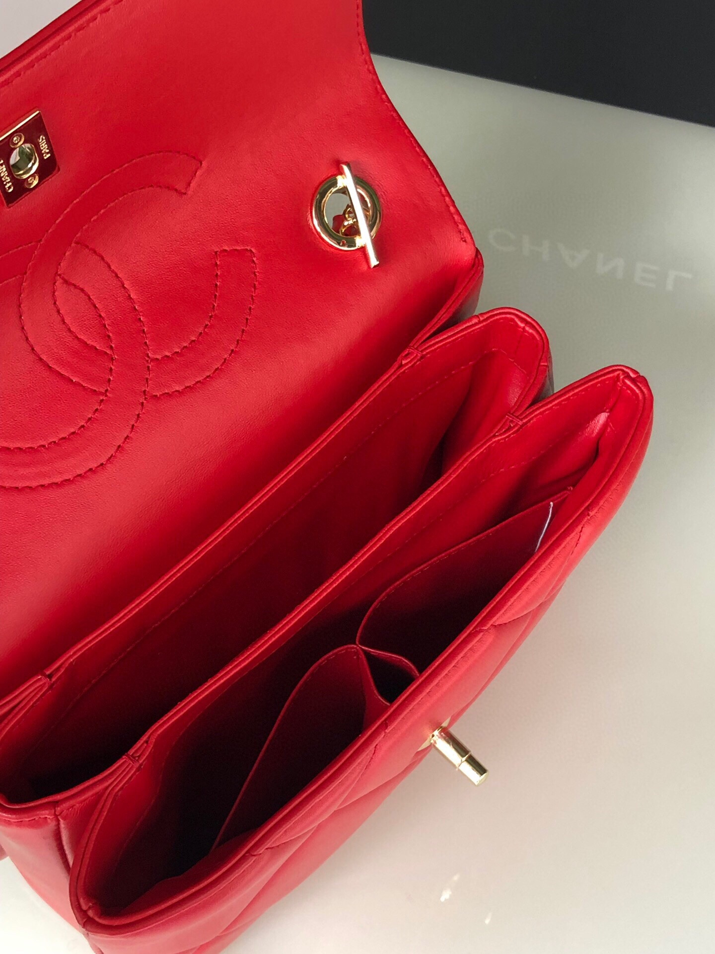 Ch*el flap bag with top handle 6.6 × 9.8 × 4.7 in