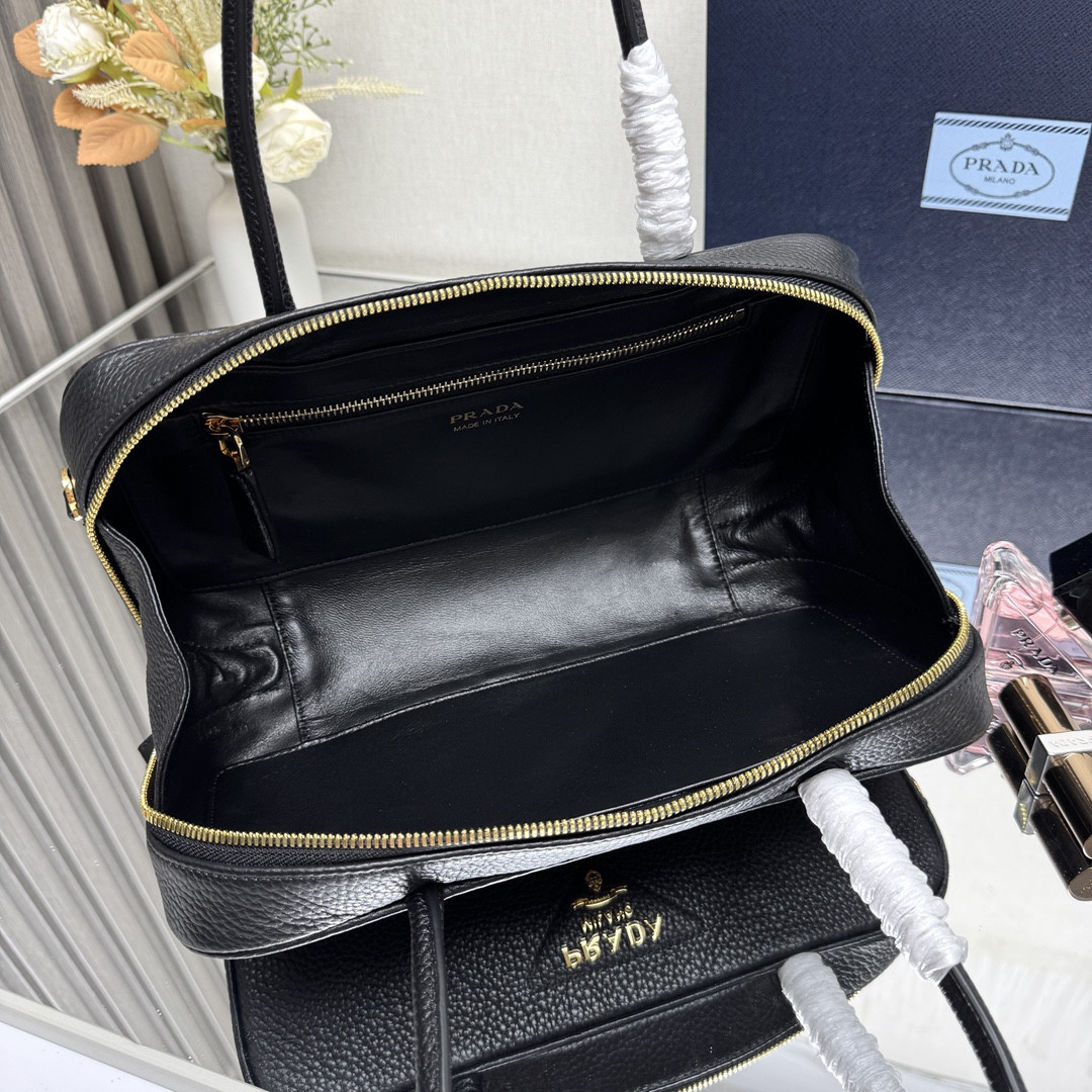 Pra*a medium top handle bag in vitello dino soft leather 13x28x8cm