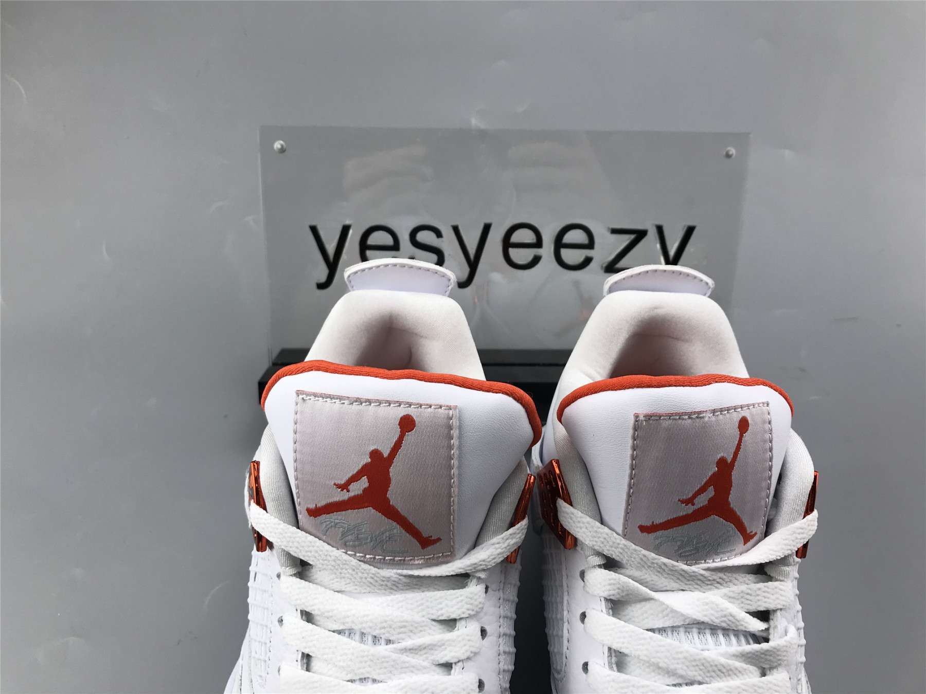 UA AIR JORDAN 4 RETRO METALLIC ORANGE