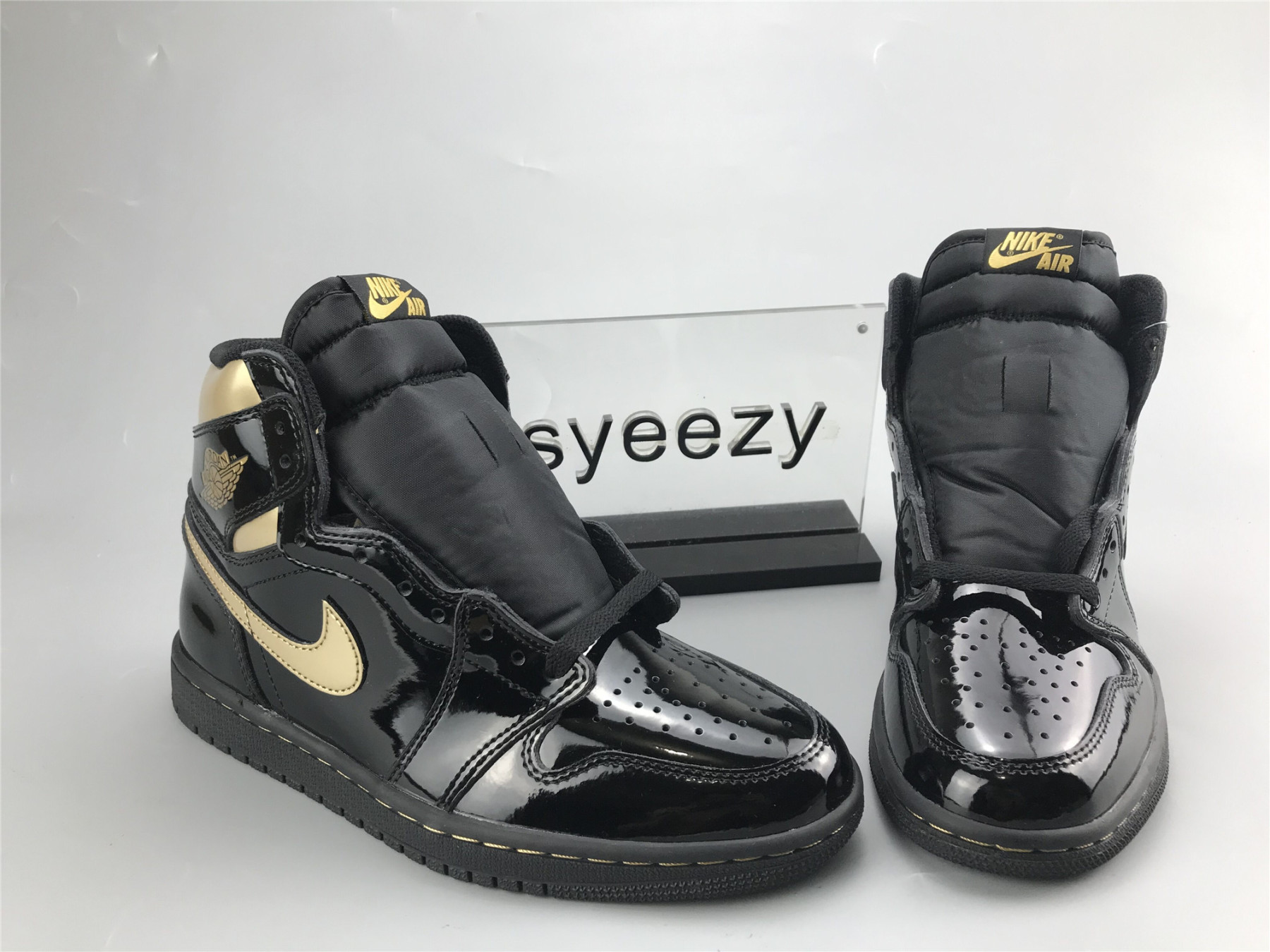 UA AIR JORDAN 1 RETRO HIGH OG BLACK METALLIC GOLD