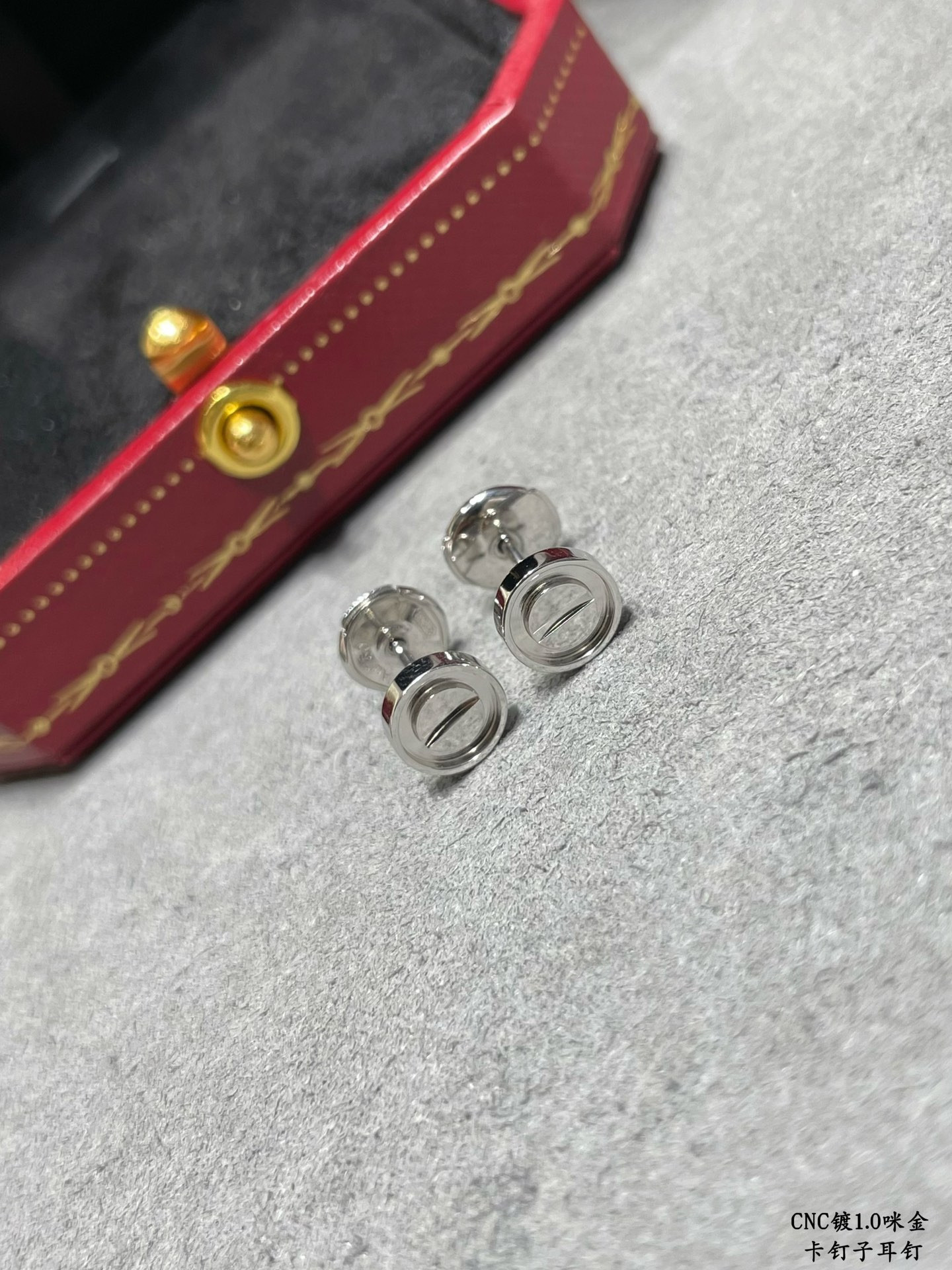 Ca*t1er nail earrings