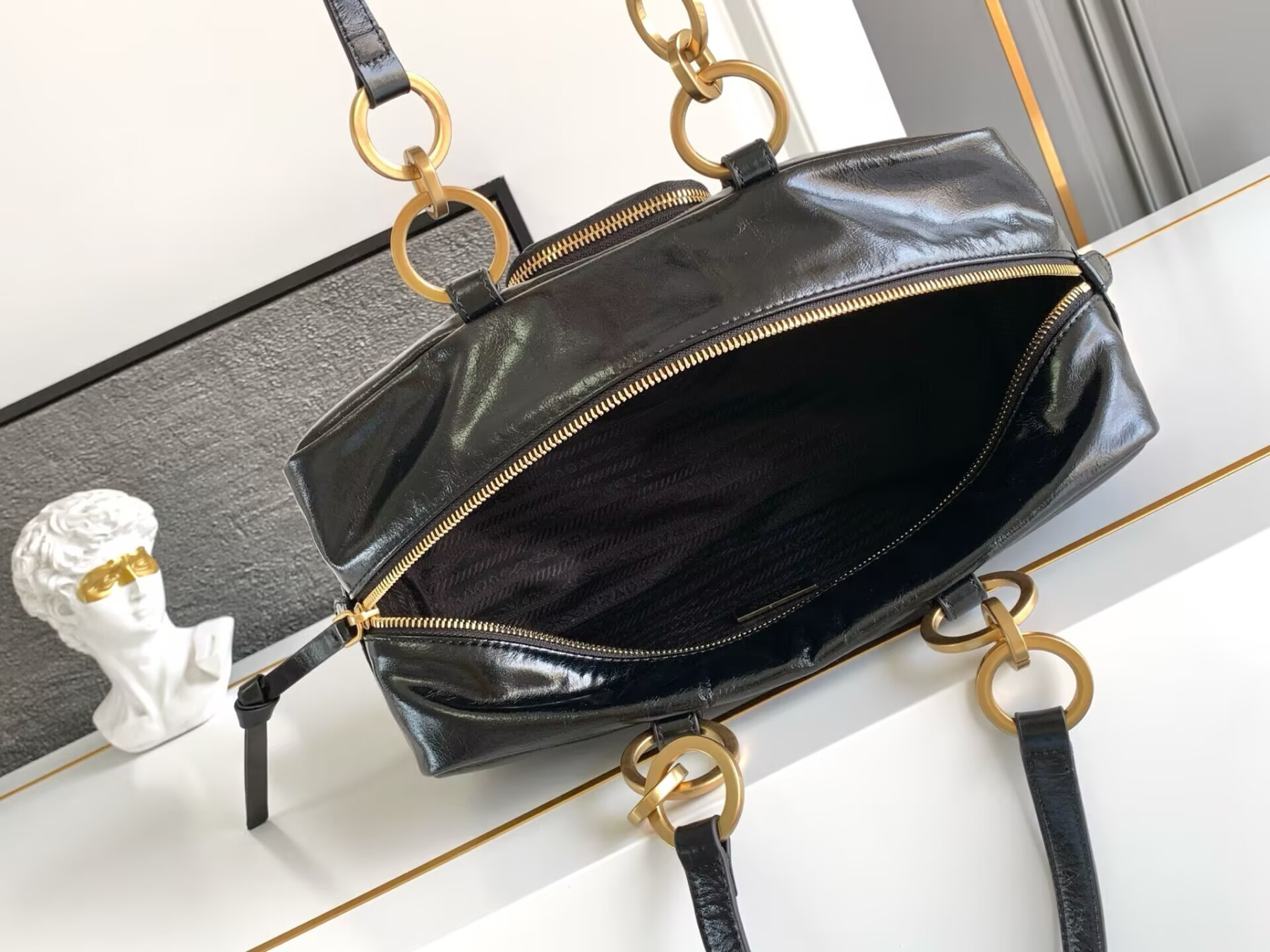 Pra*a Dangle medium leather top-handle bag 14x30x13.5cm