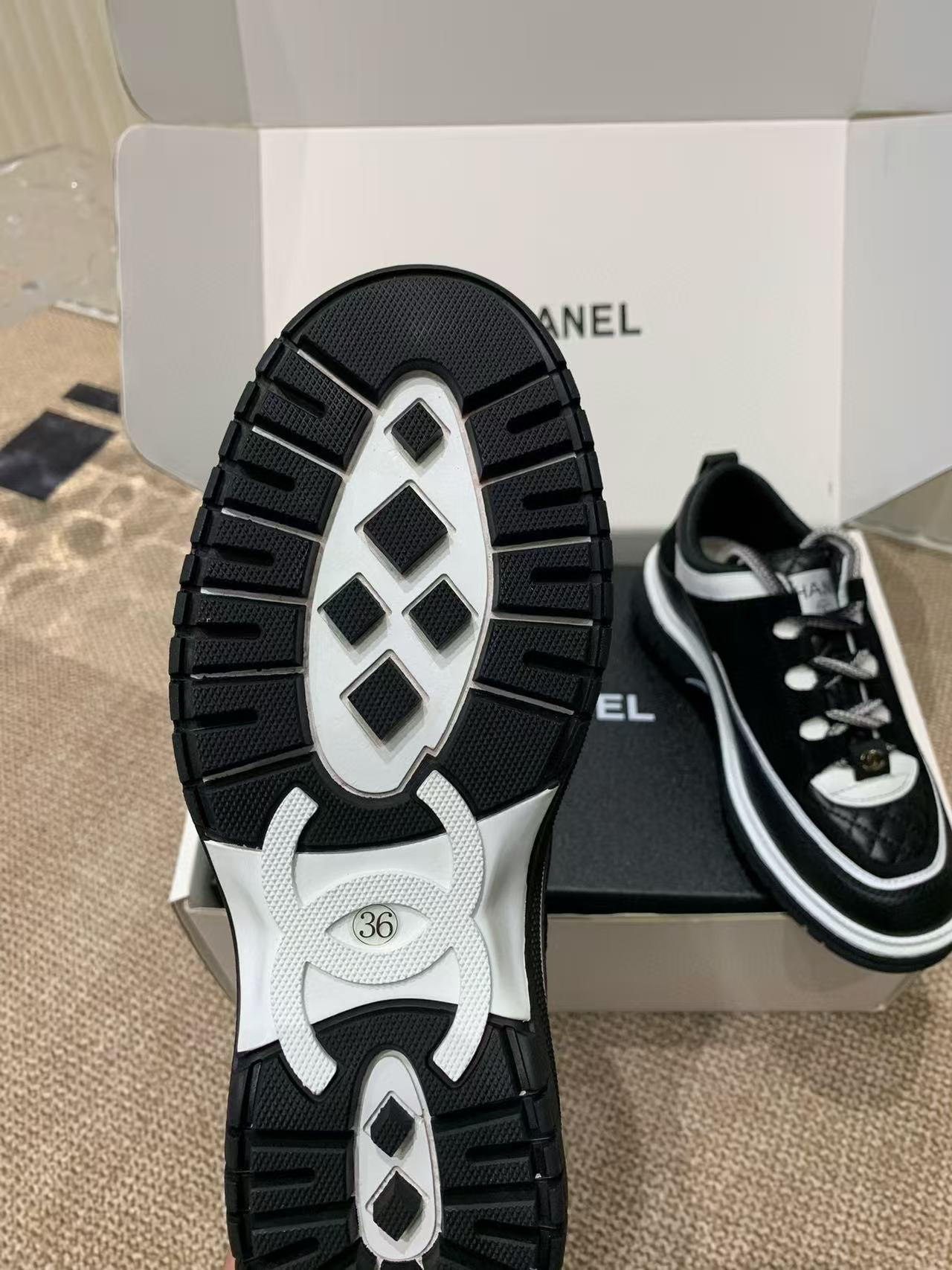 UA Ch**el Sneaker