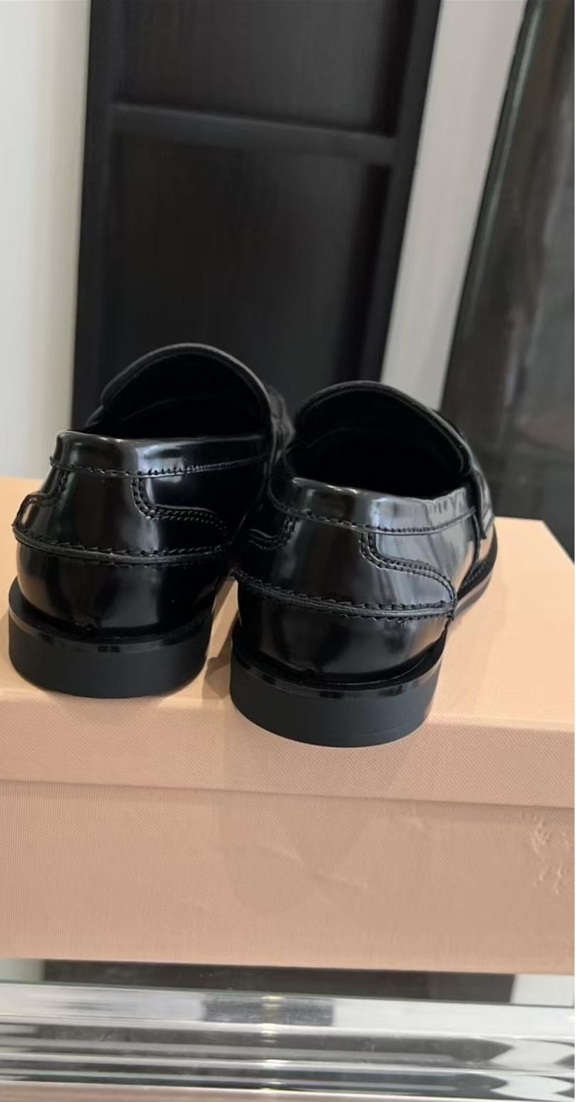 UA Miu Miu Leather Loafers