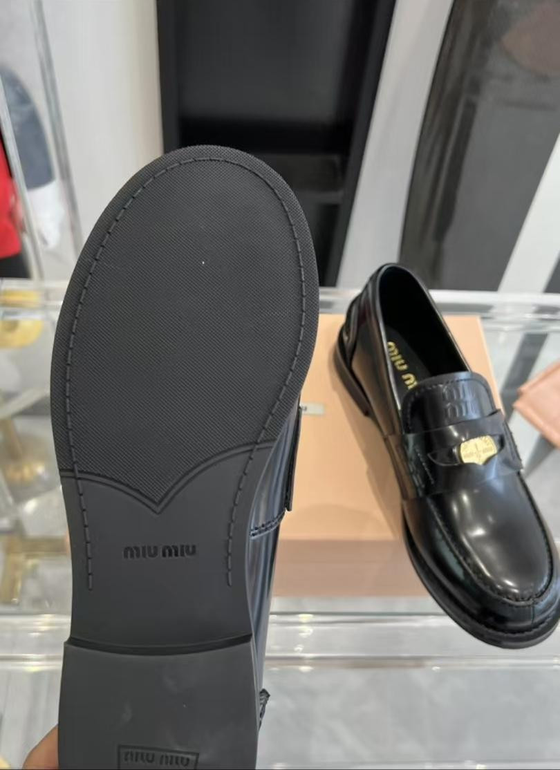 UA Miu Miu Leather Loafers