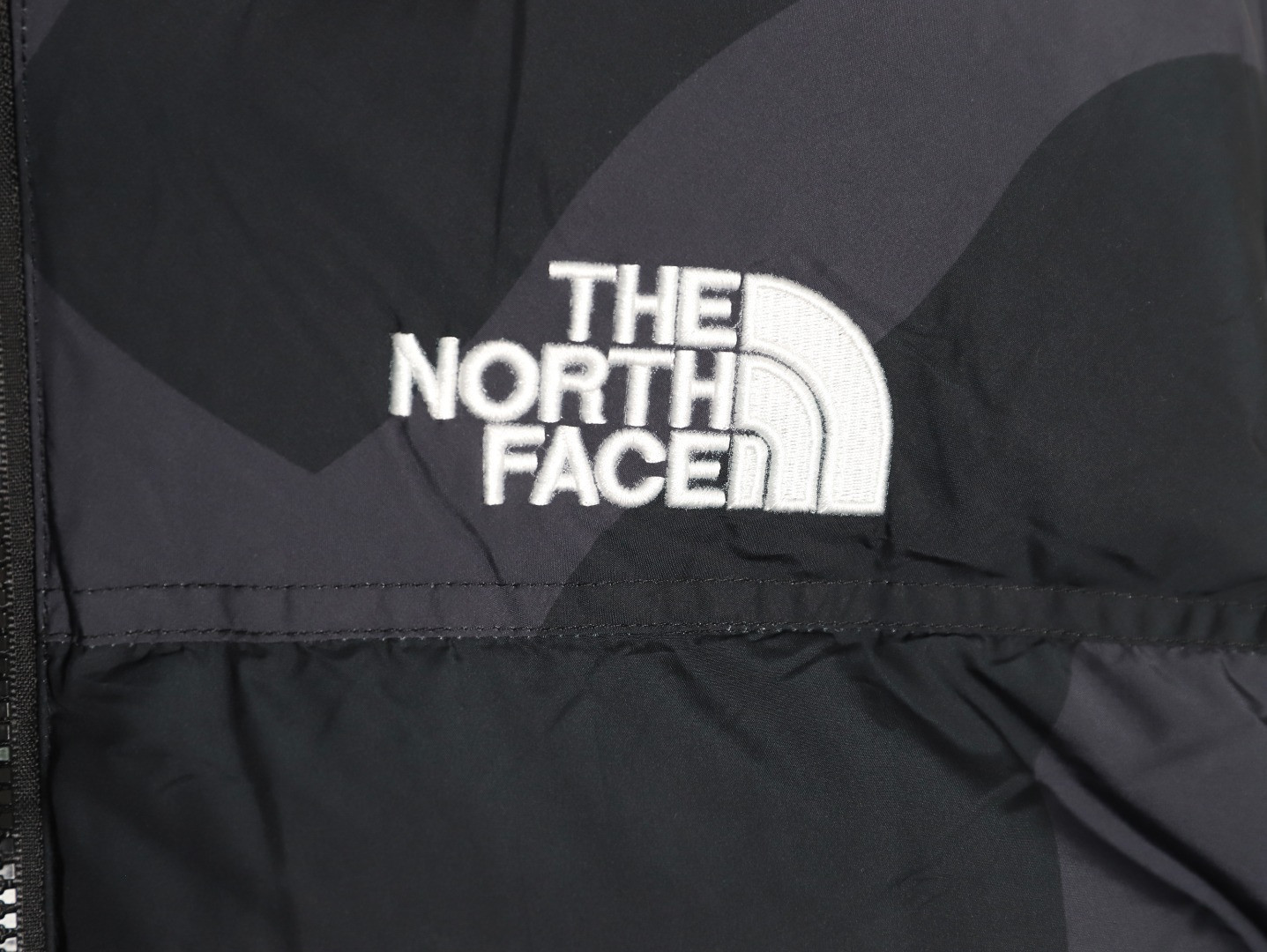 The North Face x Kaws Short Puffer jacket