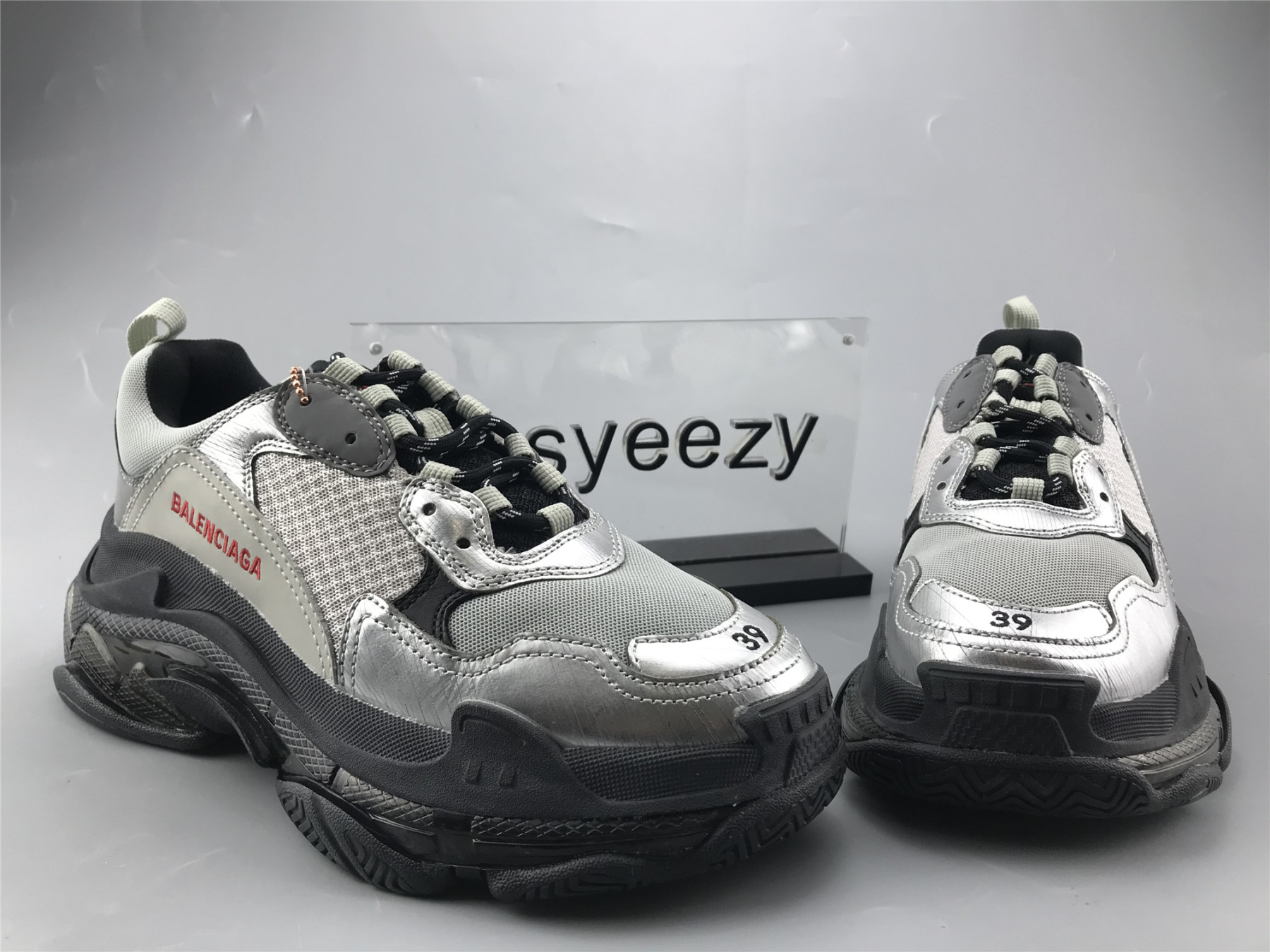 UA TRIPLE S SNEAKER BLACK AND SLIVER