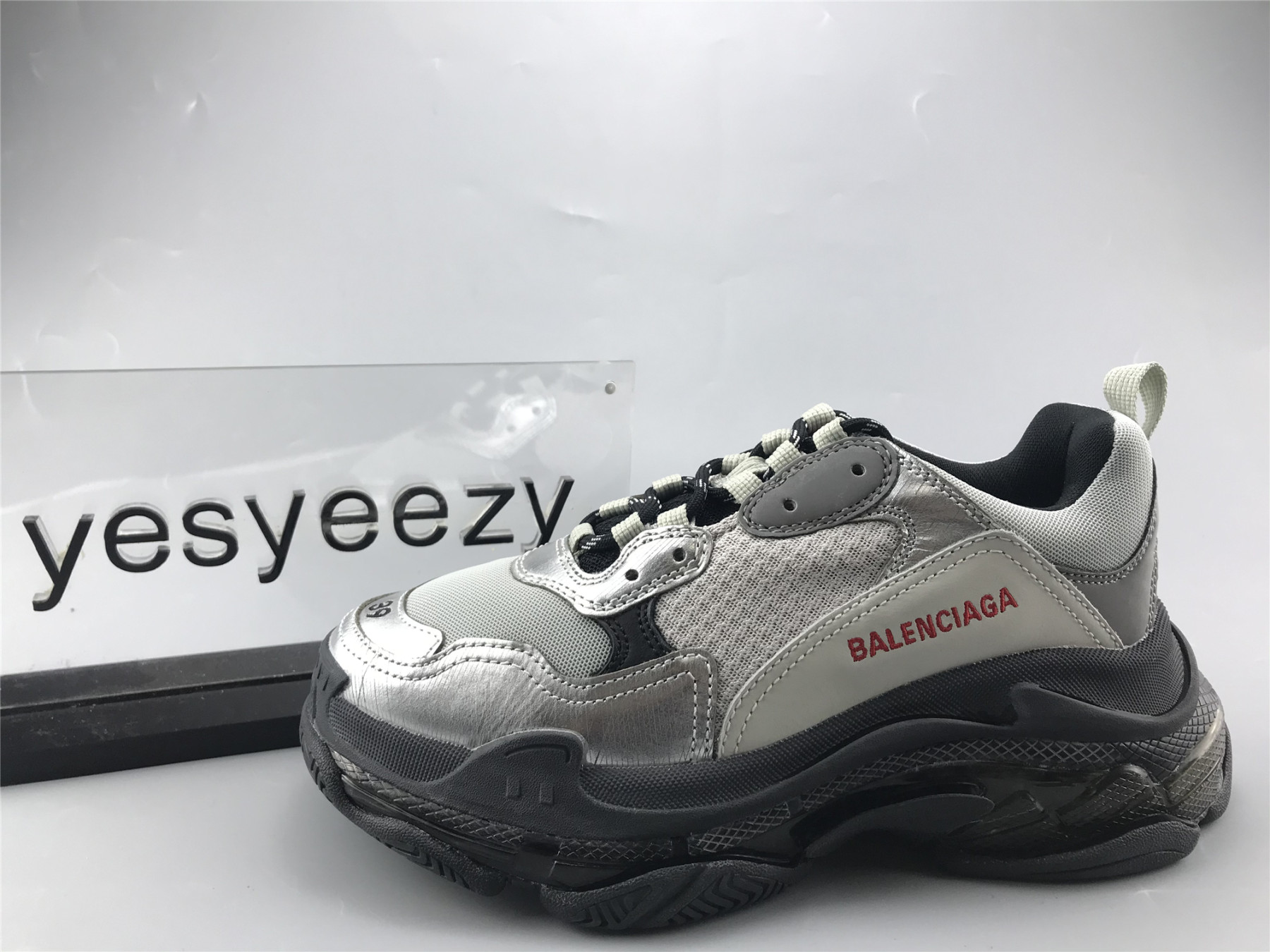 UA TRIPLE S SNEAKER BLACK AND SLIVER
