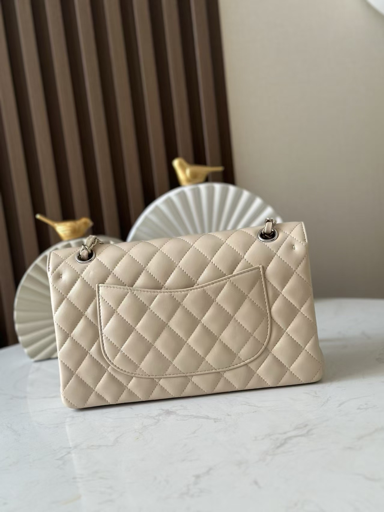 Ch**el Classic Flap Bag Pearlescent apricot-colored lambskin with silver hardware 15x25.5x6cm