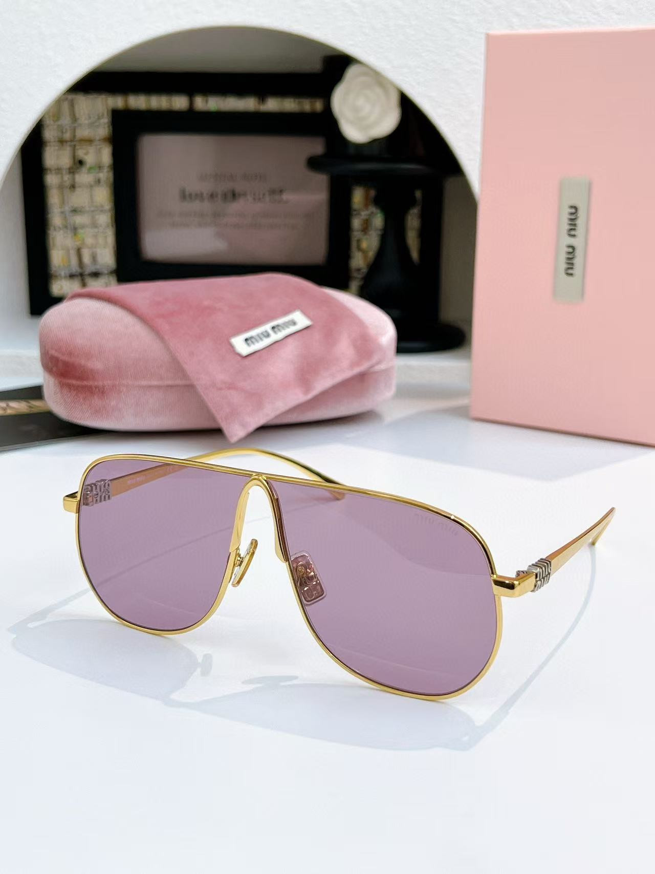 Miu Miu Glasses SMUA56