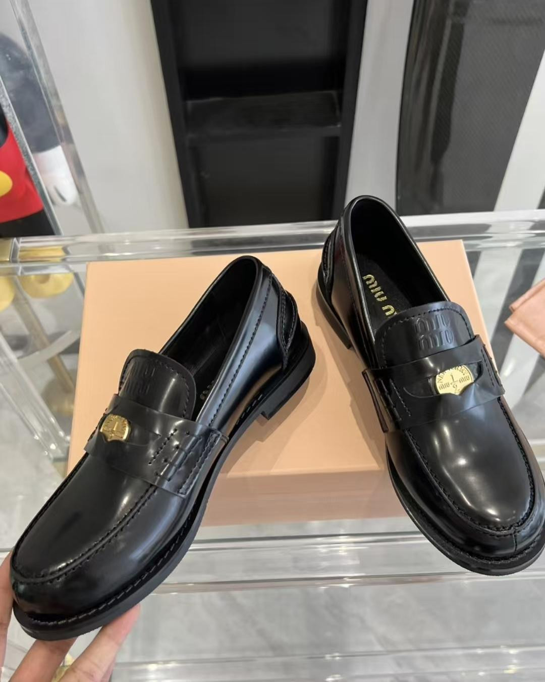 UA Miu Miu Leather Loafers