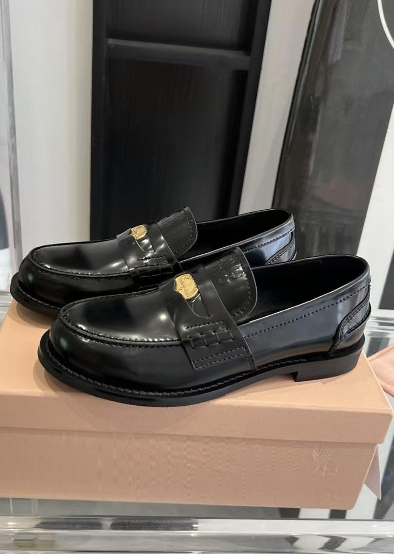 UA Miu Miu Leather Loafers
