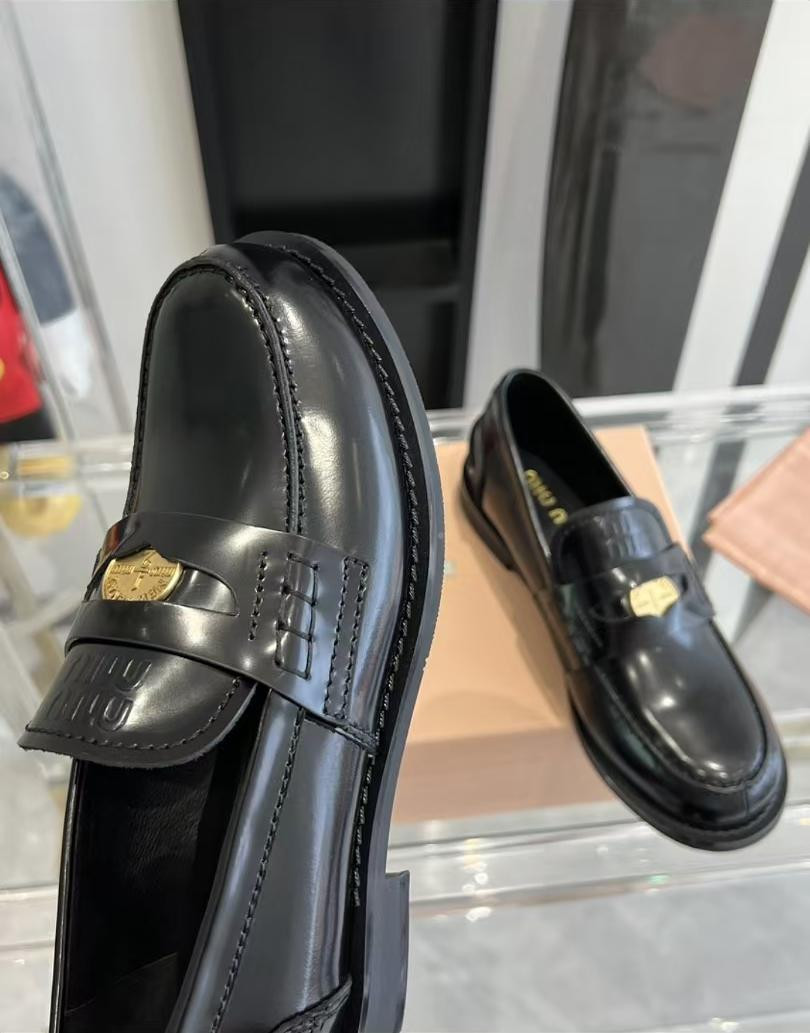 UA Miu Miu Leather Loafers