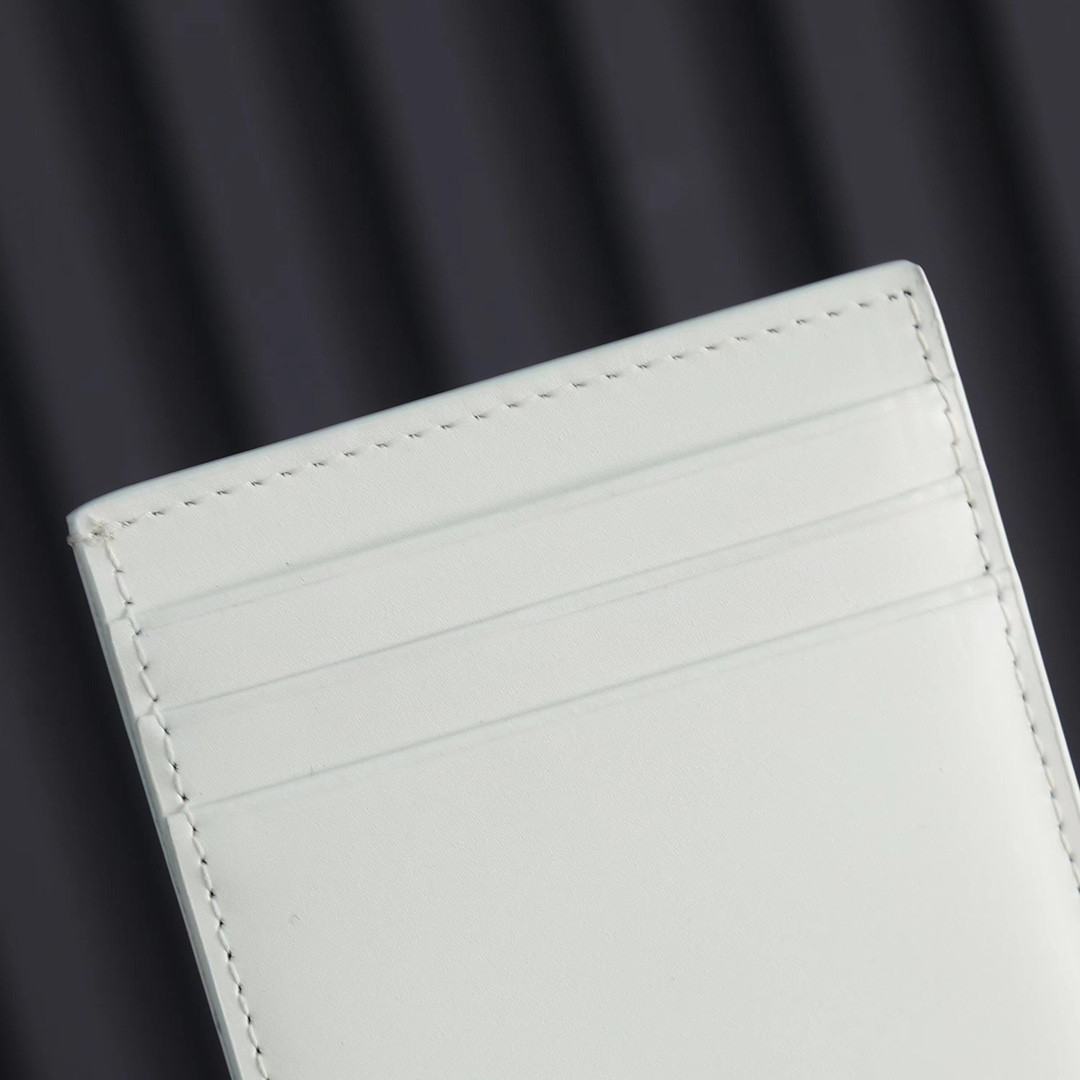 YSL UPTOWN CHAIN WALLET IN CROCODILE-EMBOSSED SHINY LEATHER 7.5 X 4.7 X 1.2 INCHES