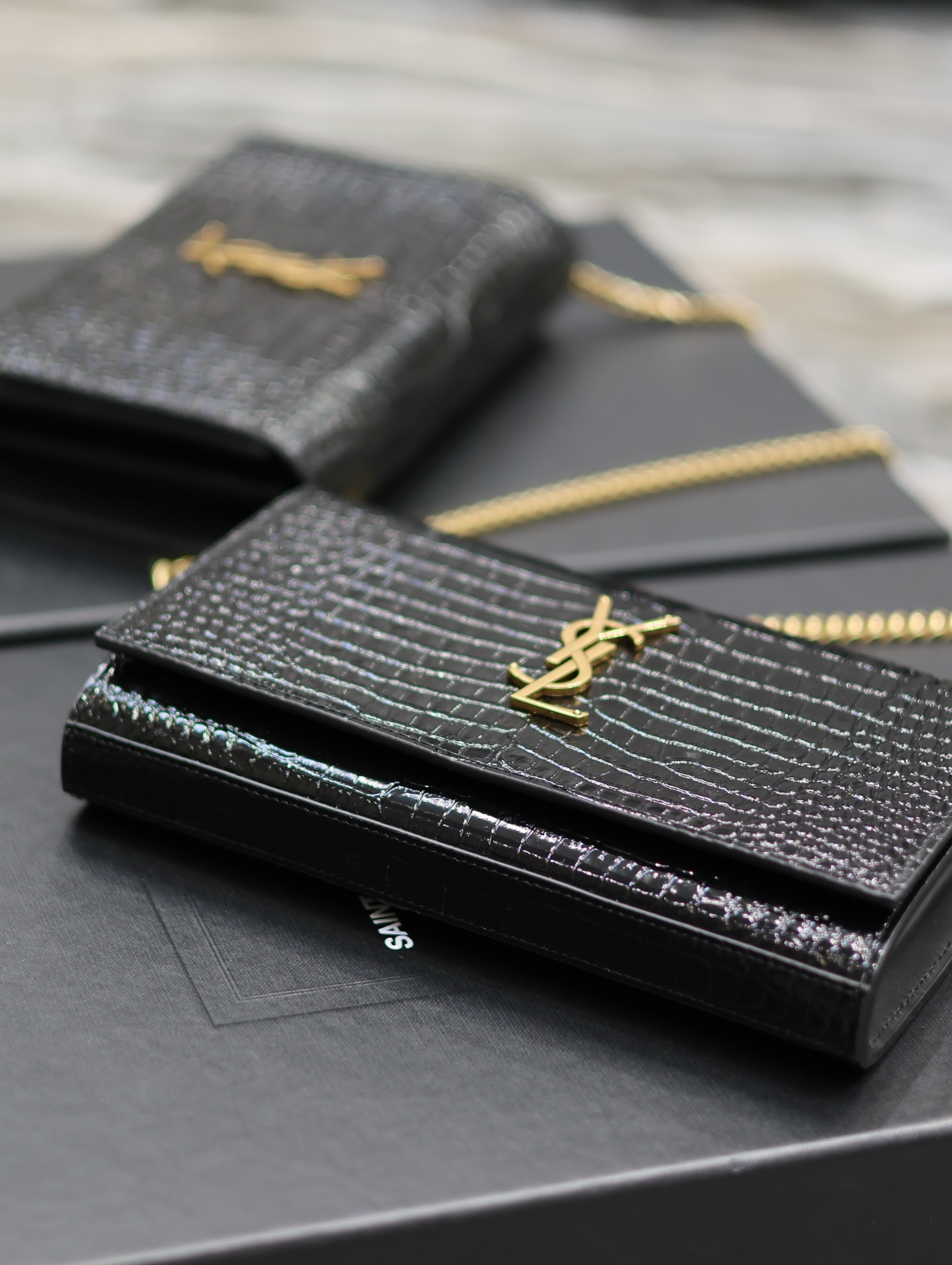 Y51 CASSANDRE CHAIN WALLET IN CROCODILE-EMBOSSED SHINY LEATHER