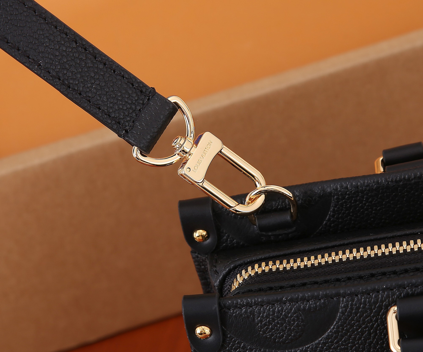 LV OnTheGo East West M23640 9.8 x 5.1 x 3.9 inches