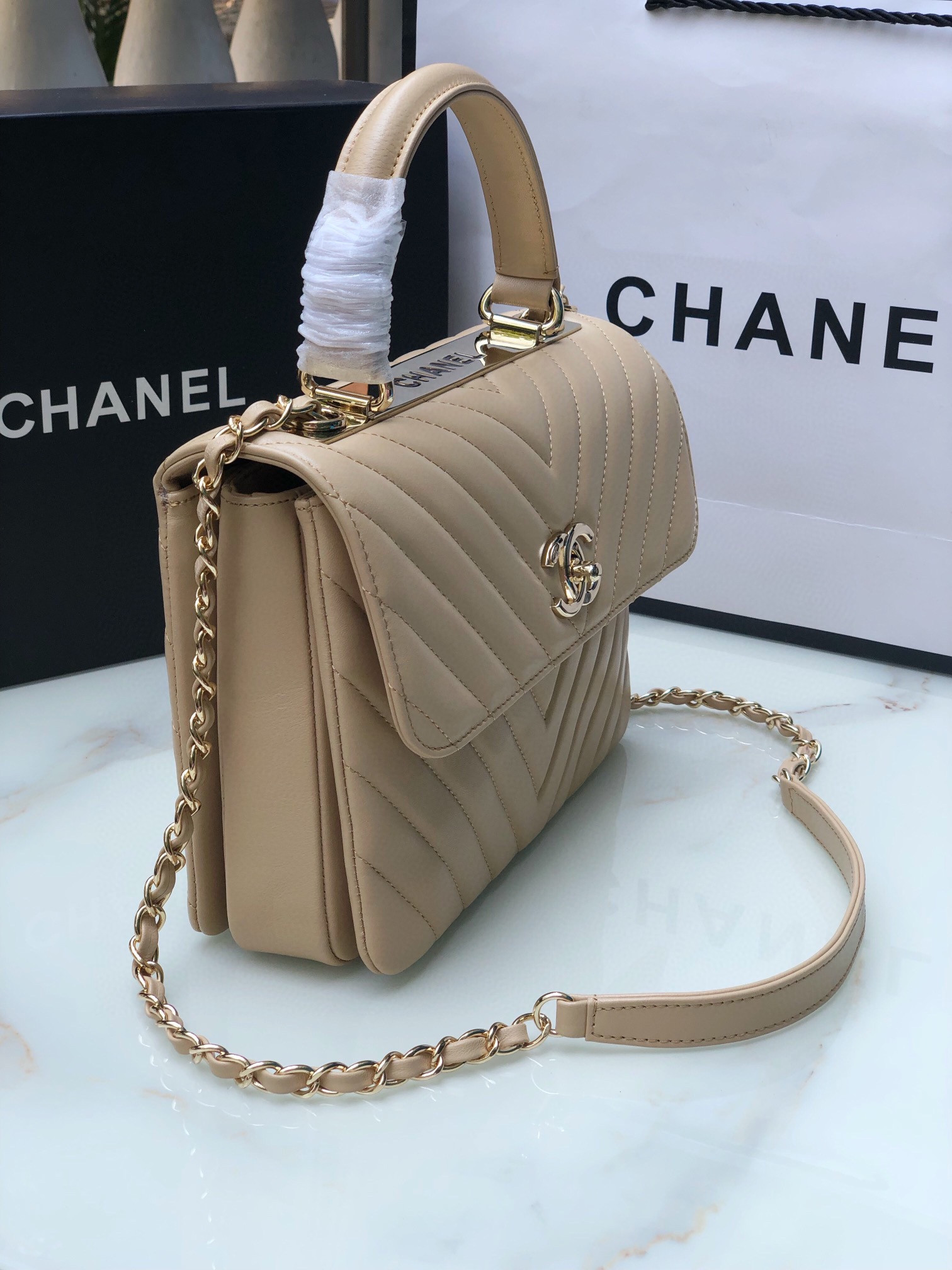 Ch**el FLAP BAG WITH TOP HANDLE BEIGE 6.6 × 9.8 × 4.7 in