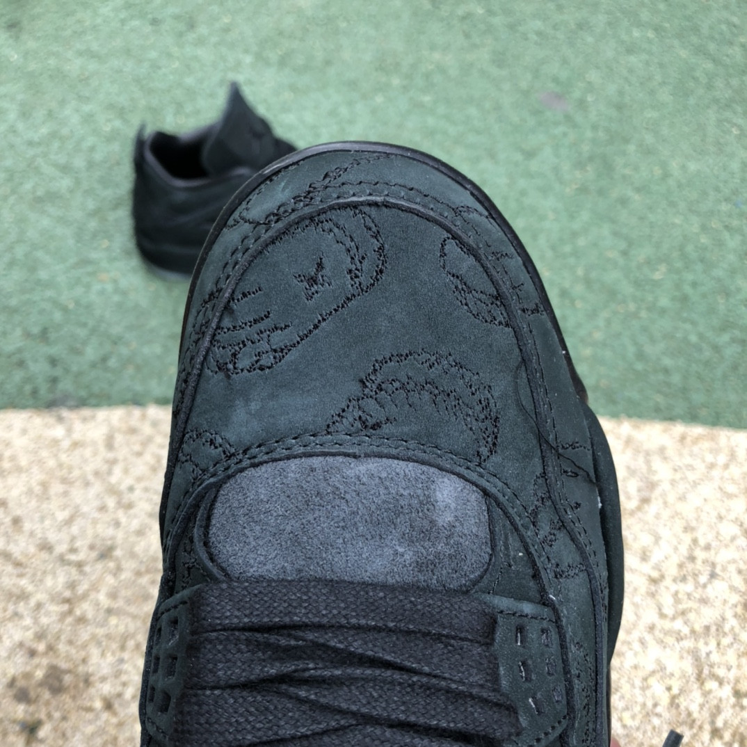 UA Jordan 4 Retro Kaws Black