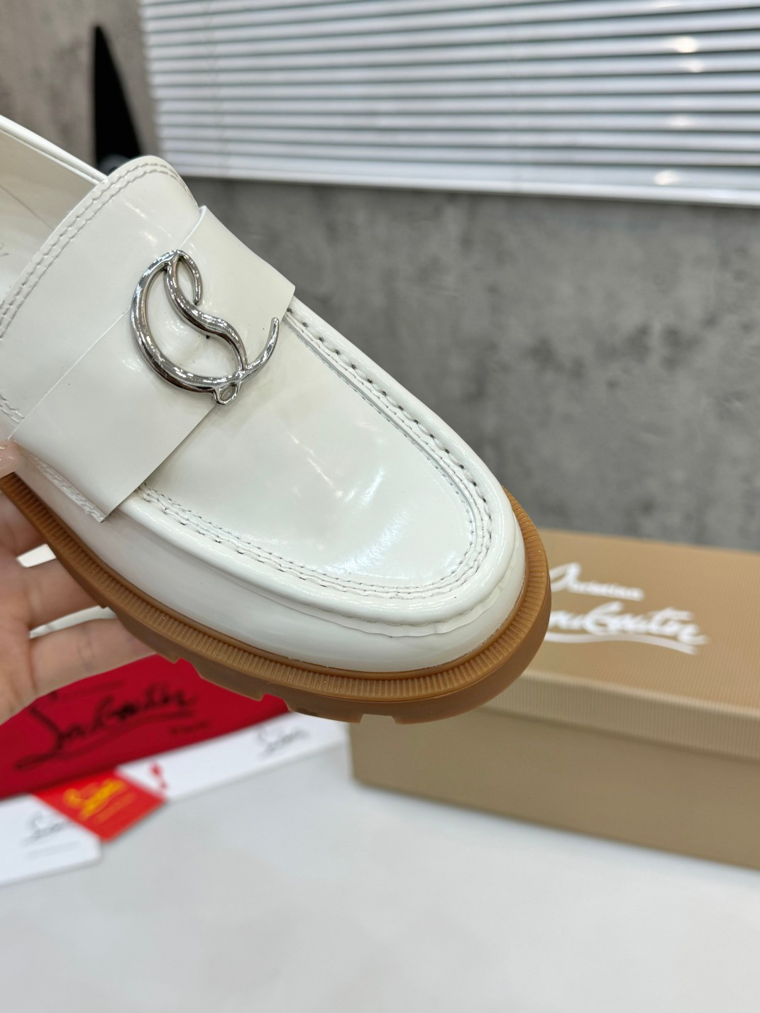 UA Chr1st1an Louboutin(CL) logo design,the latest runway version of the red-soled shoes