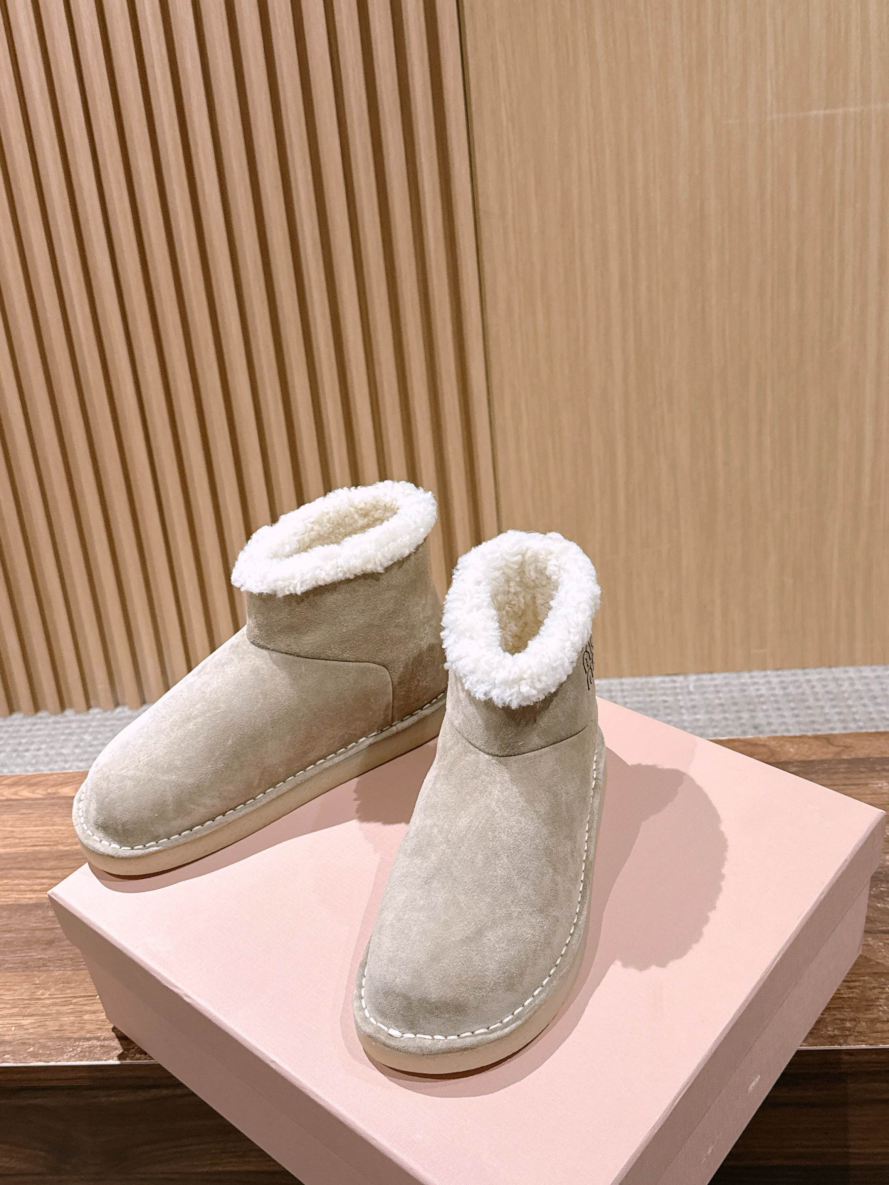 UA Miu Miu Suede and Shearling Booties