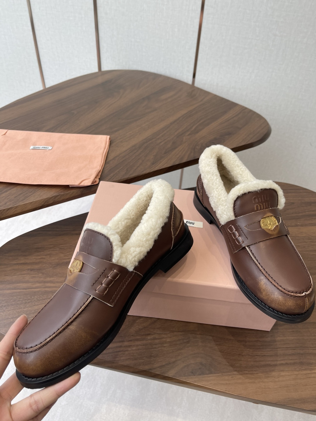 UA Miu Miu Bleached Leather and Shearling Penny Loafers
