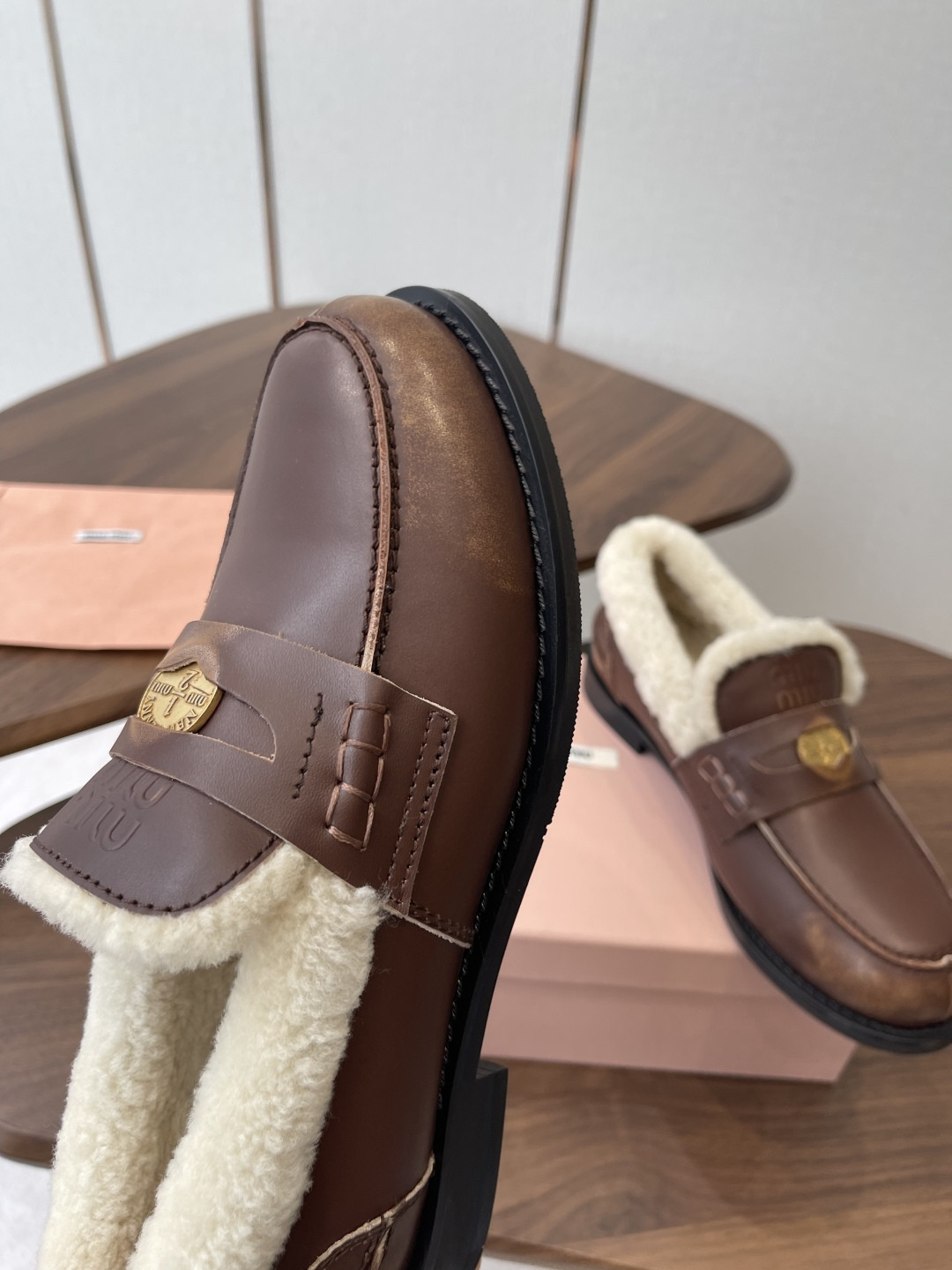 UA Miu Miu Bleached Leather and Shearling Penny Loafers