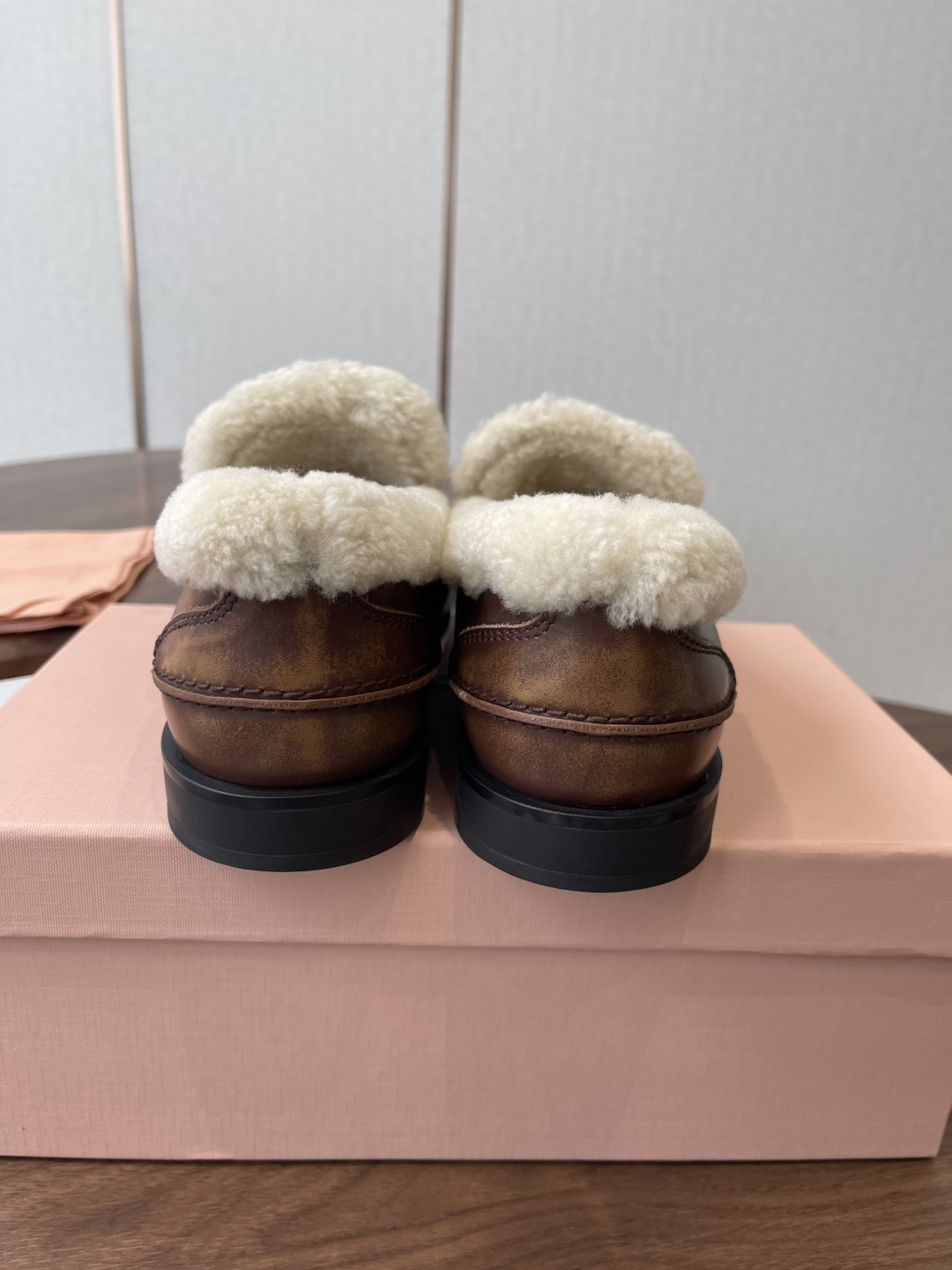 UA Miu Miu Bleached Leather and Shearling Penny Loafers