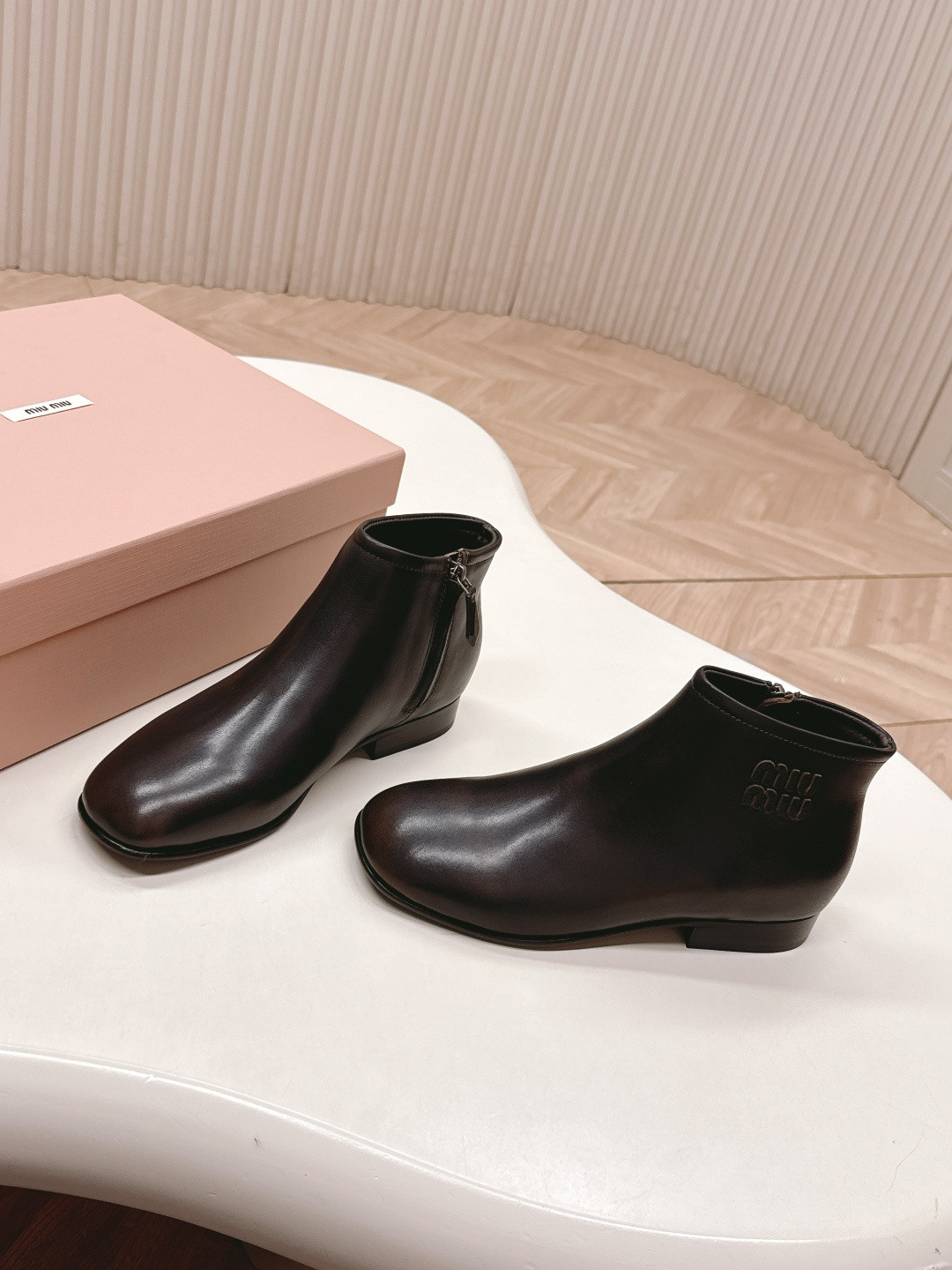 UA Miu Miu Fumé Leather Booties