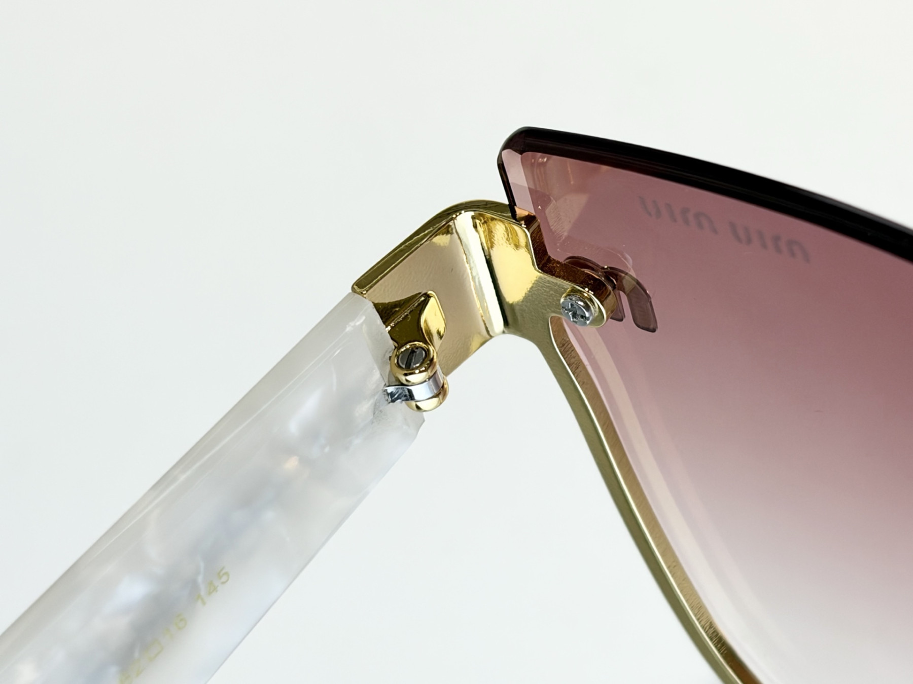 Miu Miu Glasses MU 70ZS 62-16-145